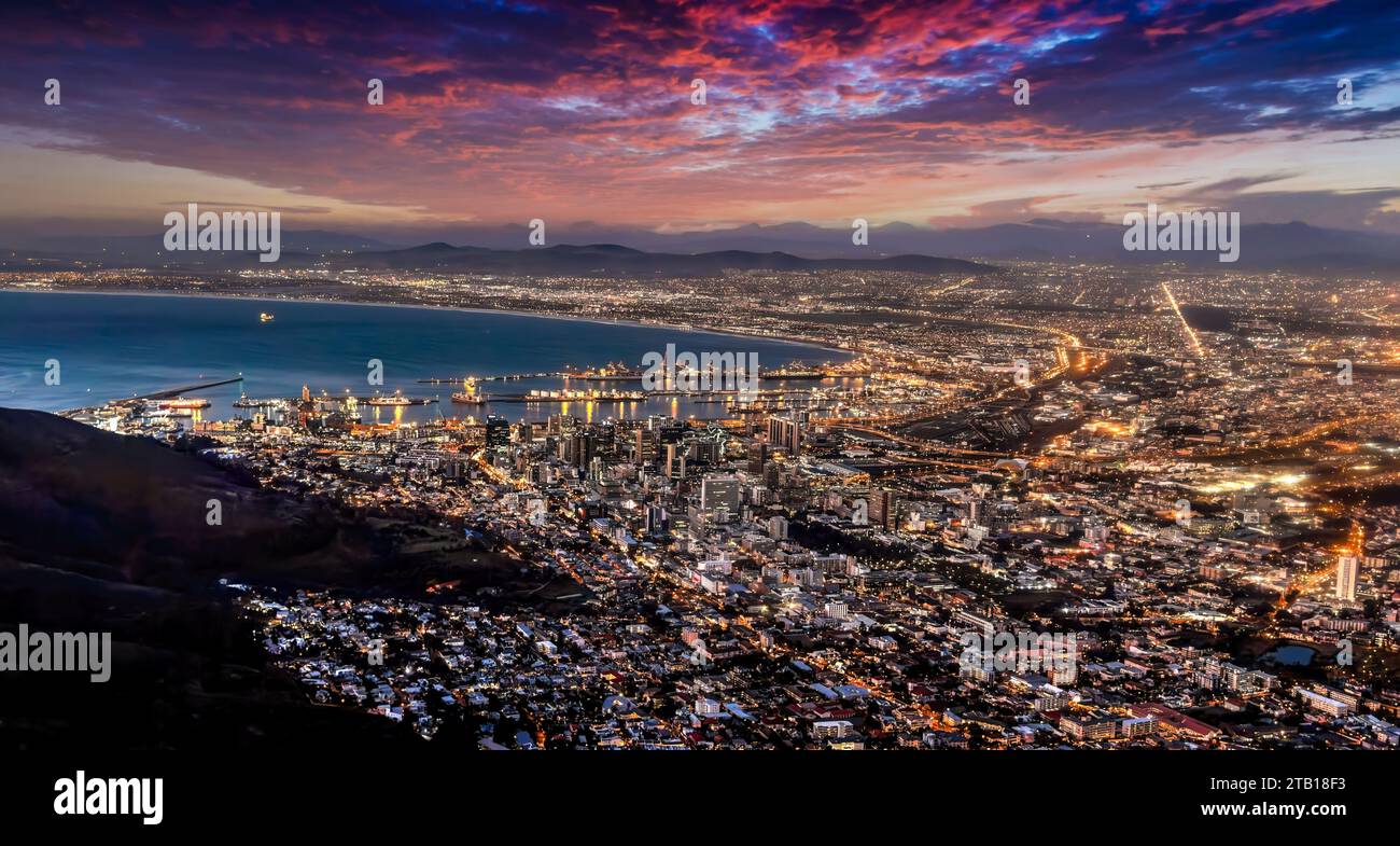 aerial view night Cape town, waterfront and the ocean, city lights are
