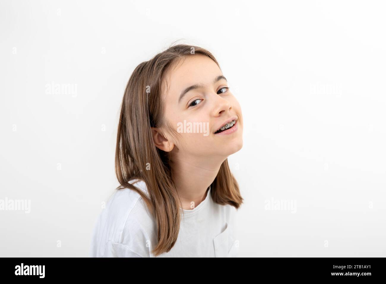 Caucasian teenage girl smiling on a white background isolated Stock ...