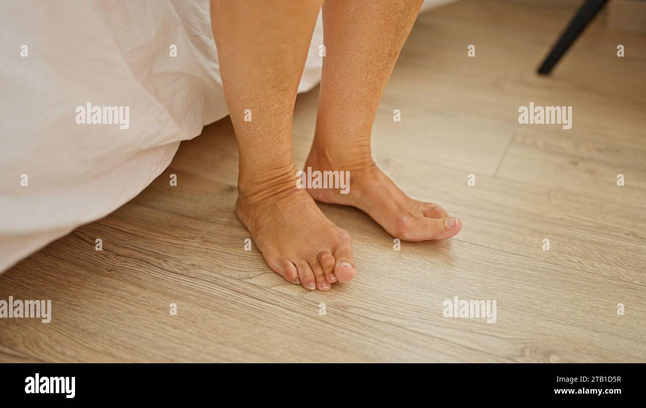 Mature woman feet standing hi-res stock photography and images - Alamy