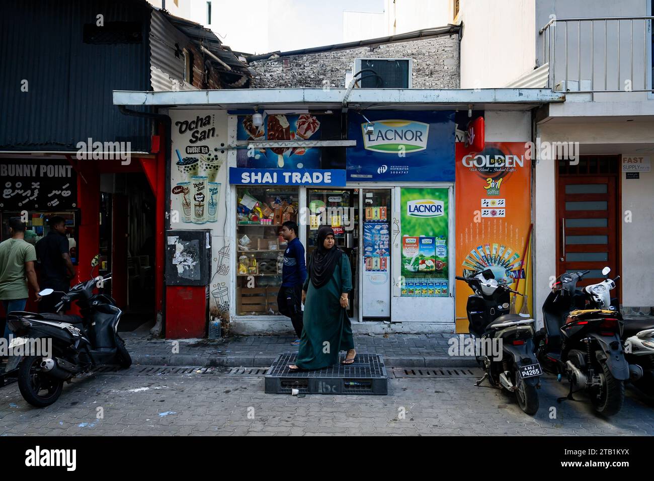 Maldives. 04th Dec, 2023. A convenience store on the corner in Malé. Daily life in Malé, Maldives, the capital city of the island nation in the Indian Ocean, whose economy depends heavily on tourism. The country's population includes many foreign nationals working from nations worldwide, including the Philippines, Myanmar, Sri Lanka, and India, and its population is predominantly Muslim. Credit: Matt Hunt/Neato/Alamy Live News Stock Photo