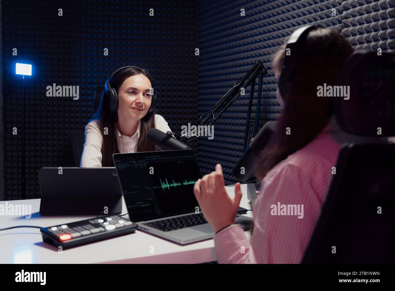 Interview In Studio In professional interview setting hi-res stock photography and images ...