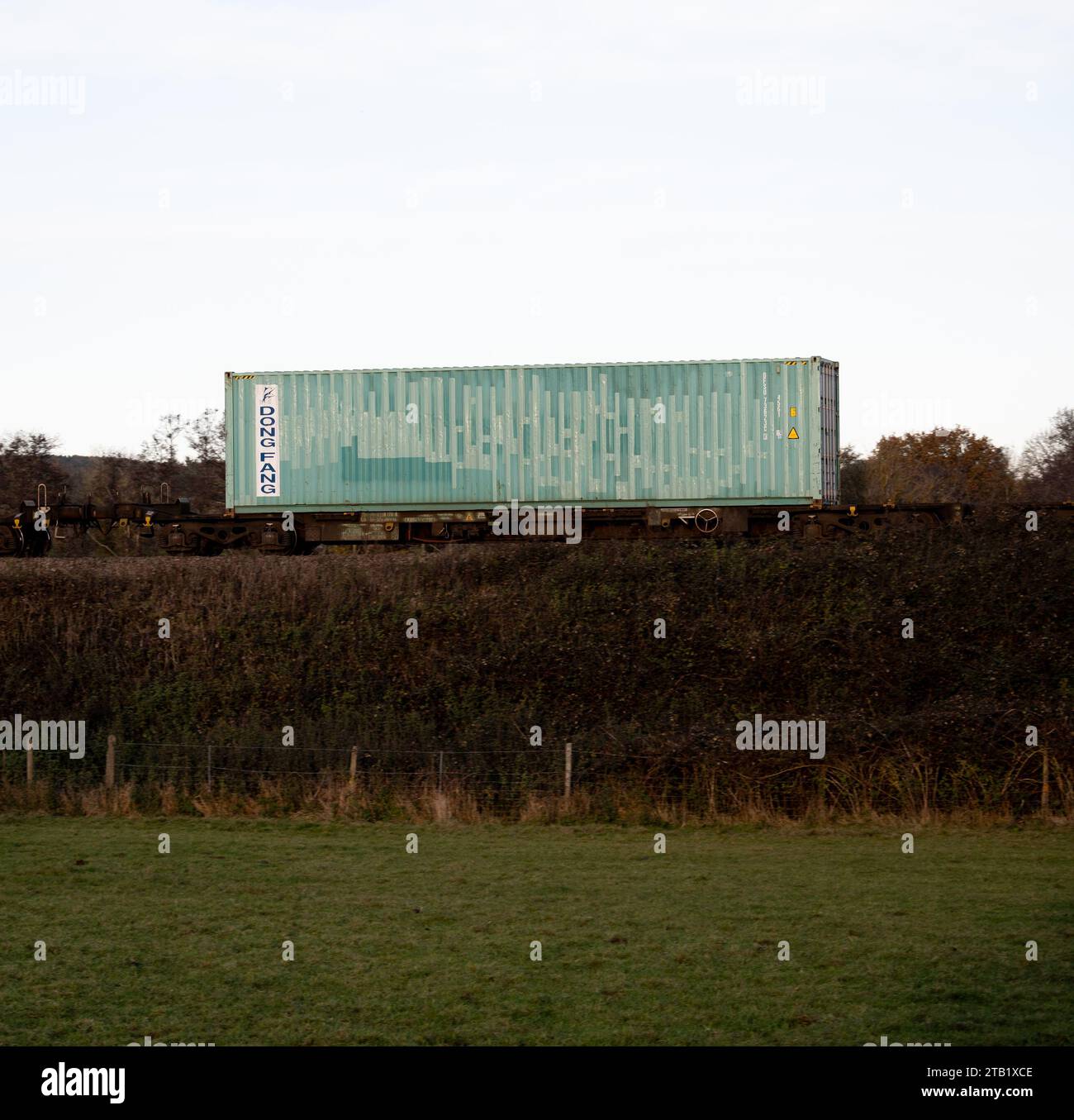 Dong Fang shipping container on a freightliner train, Warwickshire, UK Stock Photo