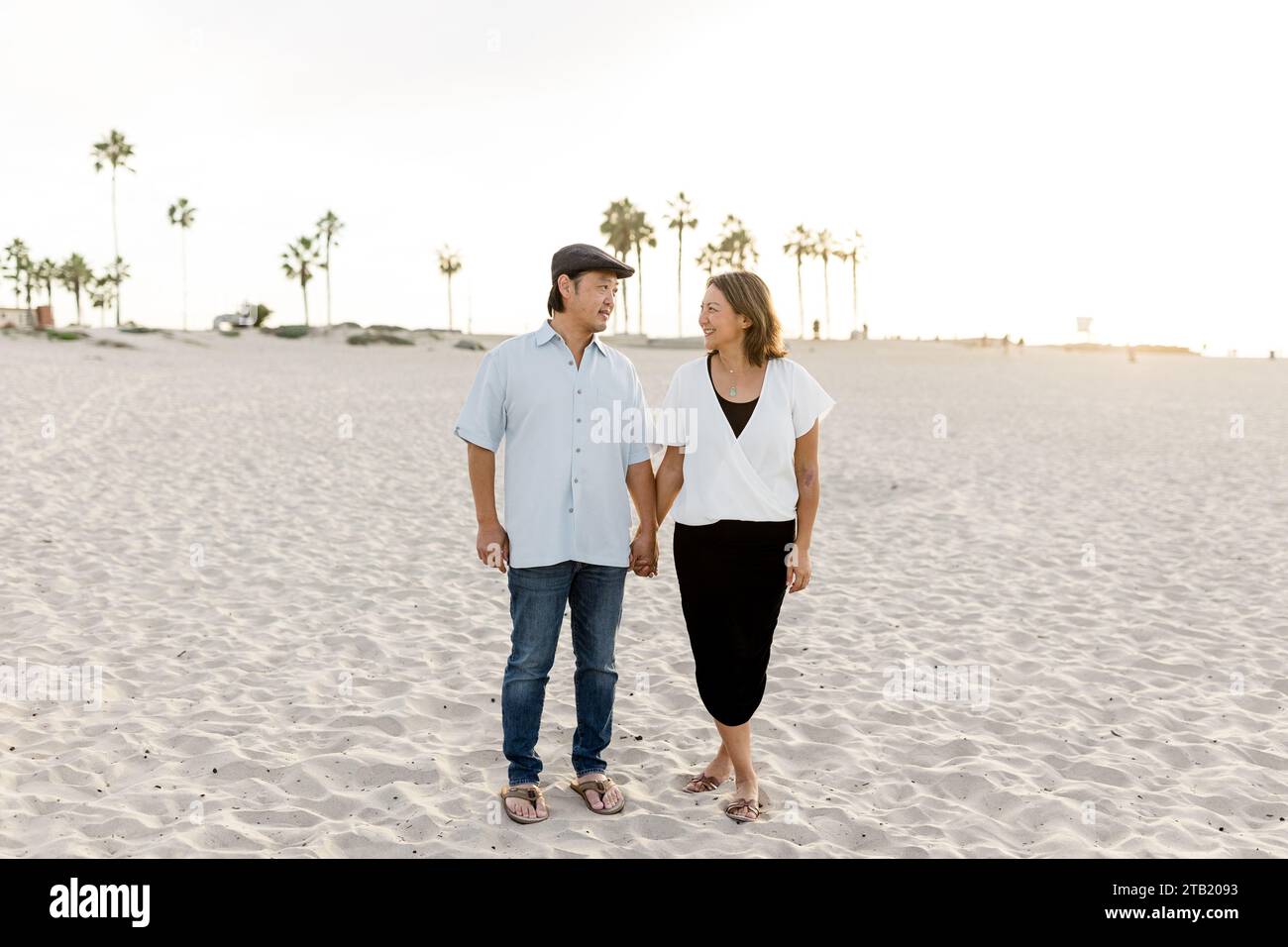 Asian family at the beach hi-res stock photography and images - Alamy