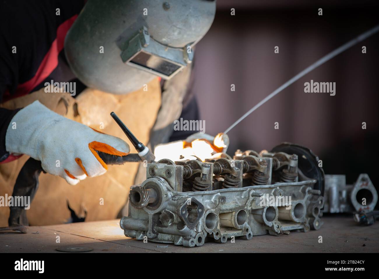 Welder is welding Tungsten Inert Gas welding, Welding aluminum with