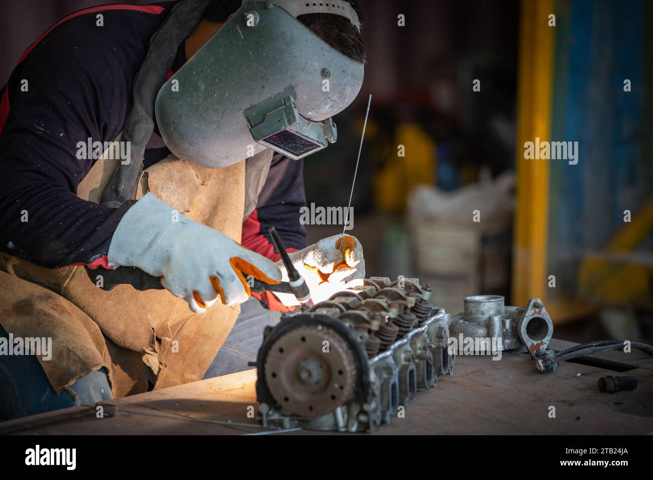 Welder is welding Tungsten Inert Gas welding, Welding aluminum with