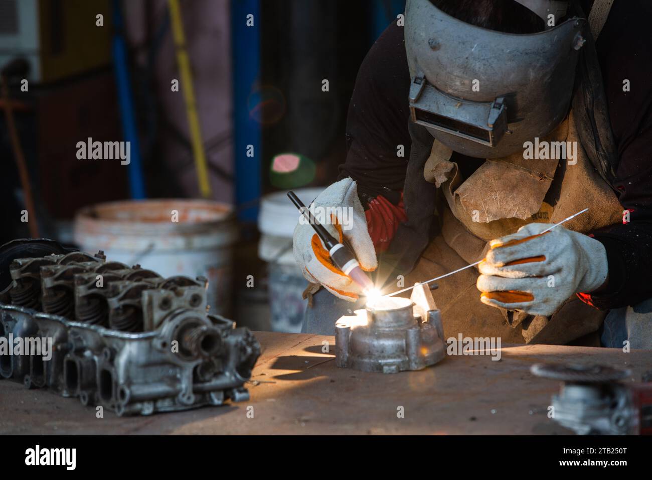 Welder is welding Tungsten Inert Gas welding, Welding aluminum with