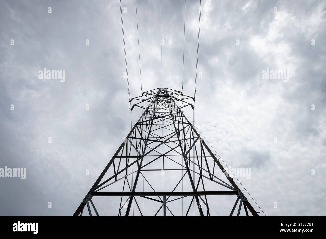 Electricity pylon, looking up to the sky. Stock Photo