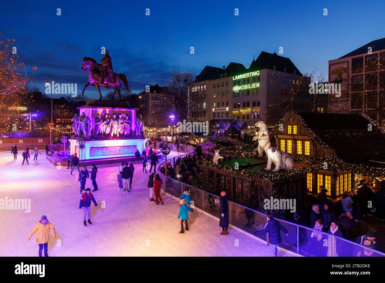 ice skating rink on the Christmas market at the Heumarkt in the historic town, equestrian statue for the Prussian king Friedrich Wilhelm III., Cologne Stock Photo