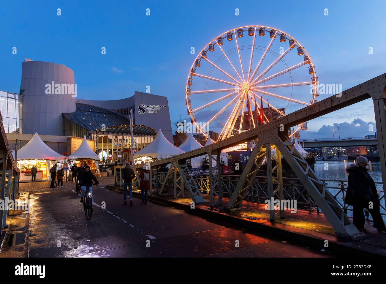 ferris wheel at the Chocolate Museum at the Christmas market in the Rheinau harbor, swing bridge