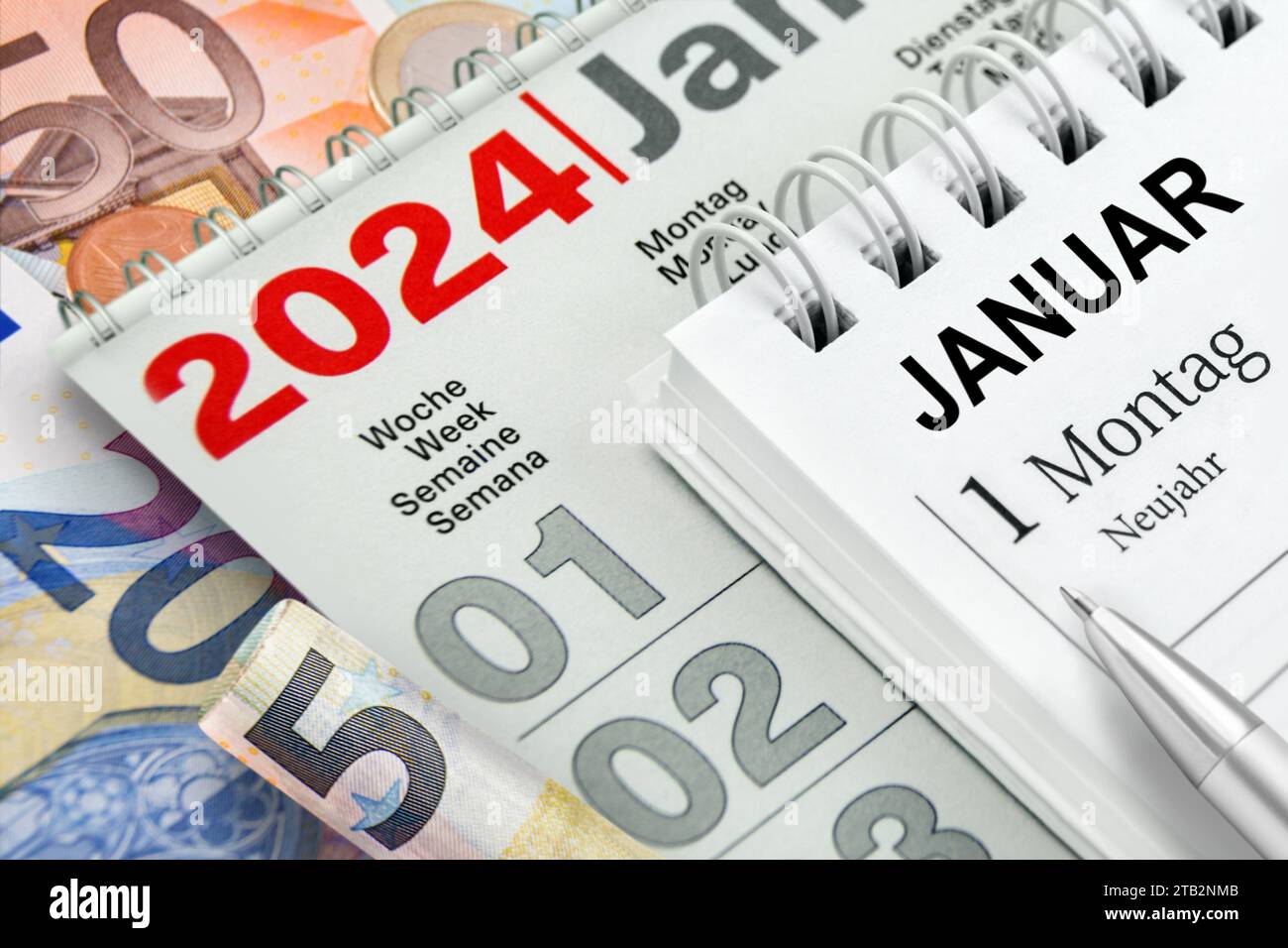 German calendar 2024 January 1 Monday New Year and Euro banknotes Stock