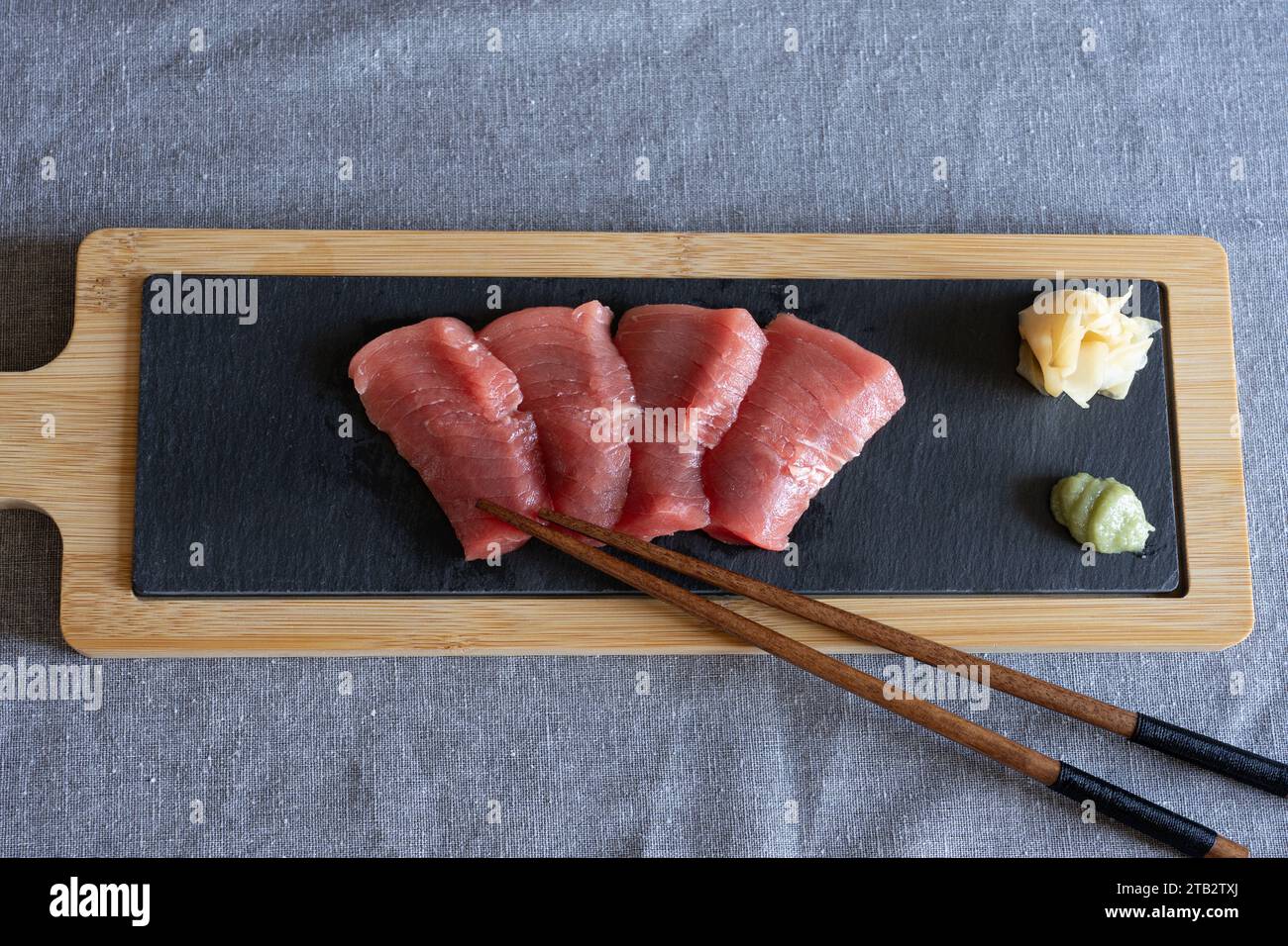 Japanese style home eating - homemade raw Akami tuna sashimi on a slate