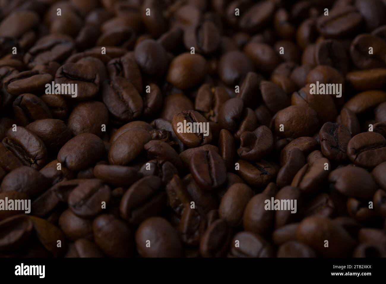 Roasted coffee beans background abstract top view Stock Photo - Alamy