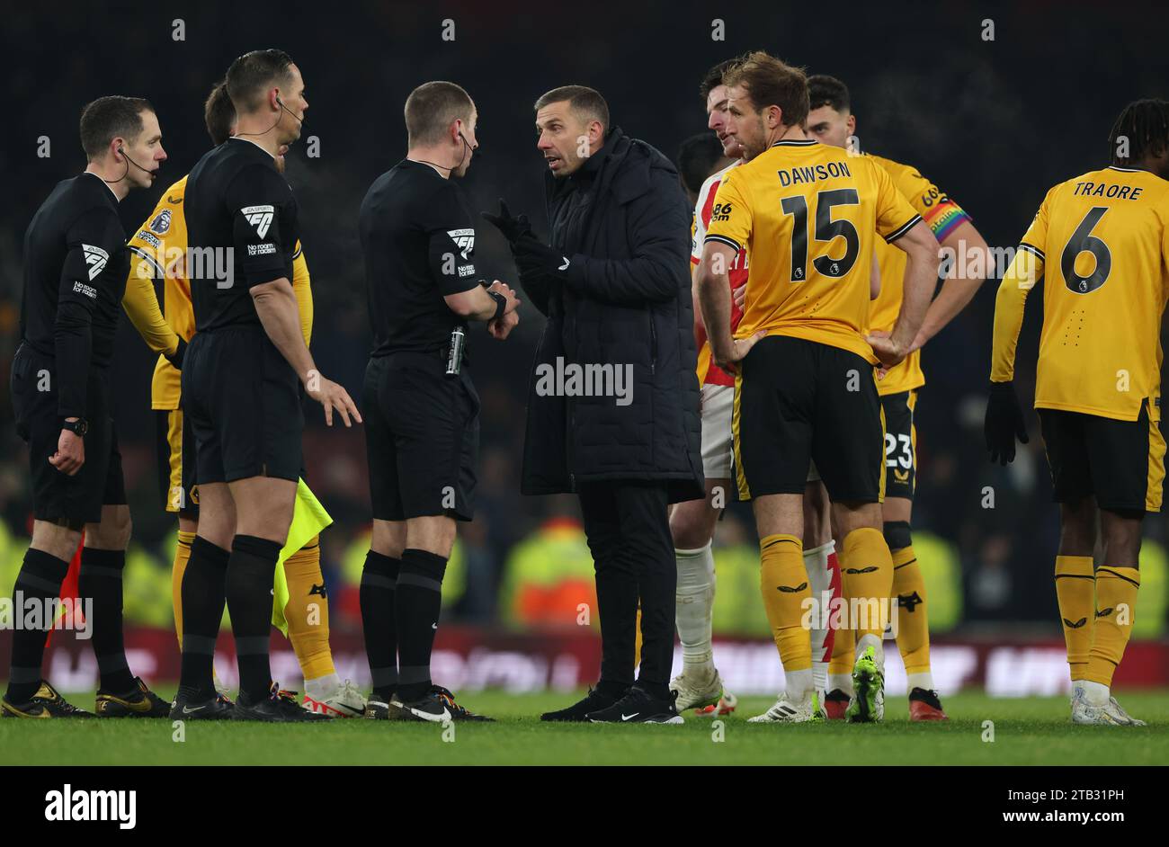 London, UK. 02nd Dec, 2023. Gary O'Neill (Wolves manager) speaks to ...