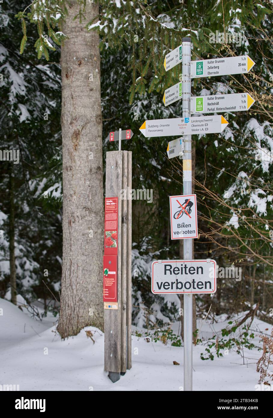 Multi purpose direction signpost at a trekking path in Sulzberg, Vorarlberg, Austria Stock Photo