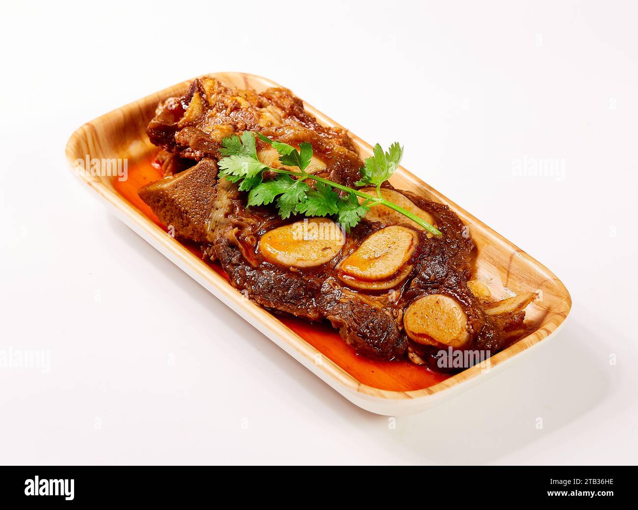 Sautéed Calf Ribs with Spicy Salt,Braised Short Ribs on a white ...