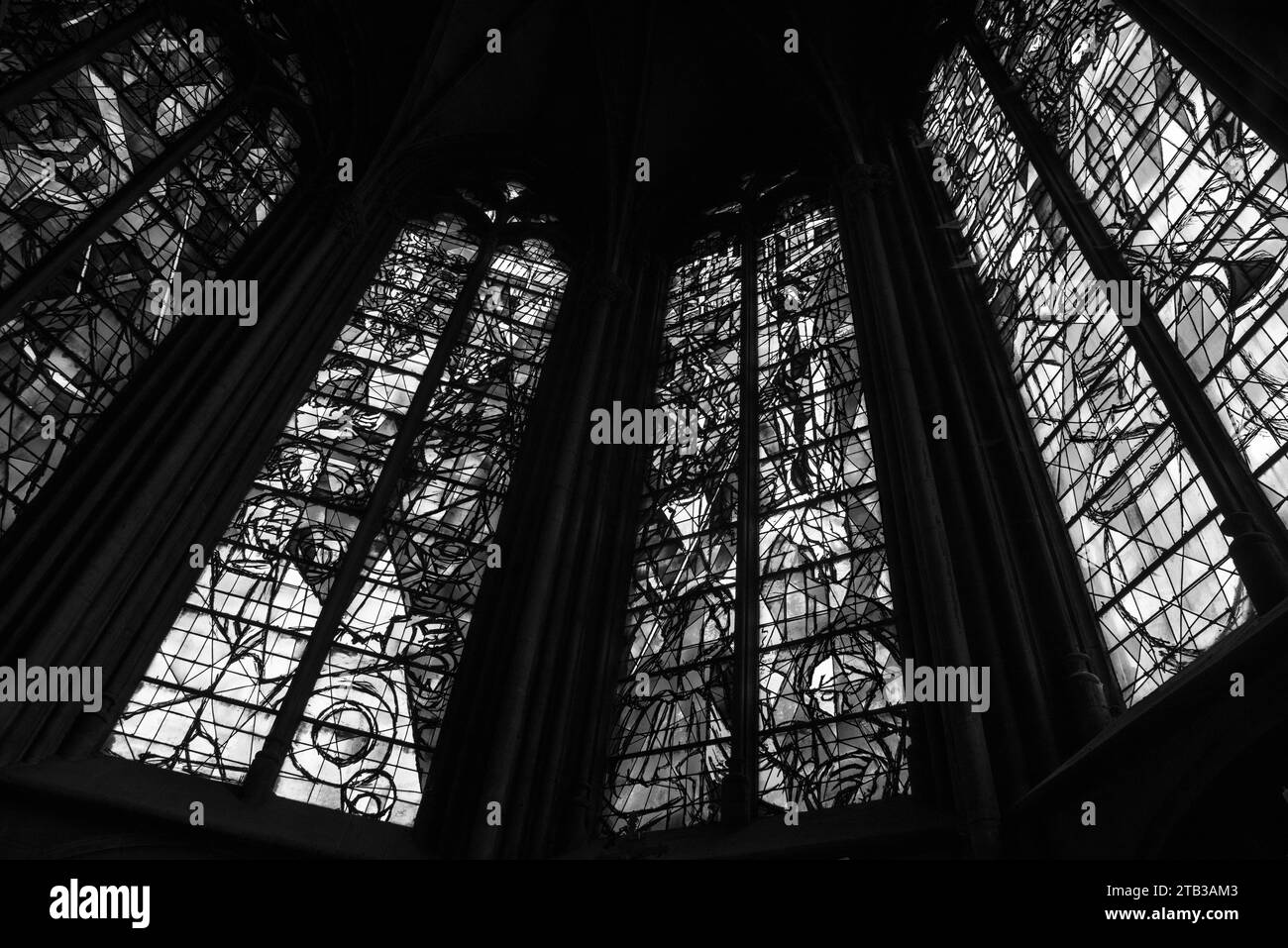 Stained glasses by Jacques Villon representing Last Supper, Crucifixion, Easter in Saint Etienne cathedral of Metz, France. Black white historic photo Stock Photo