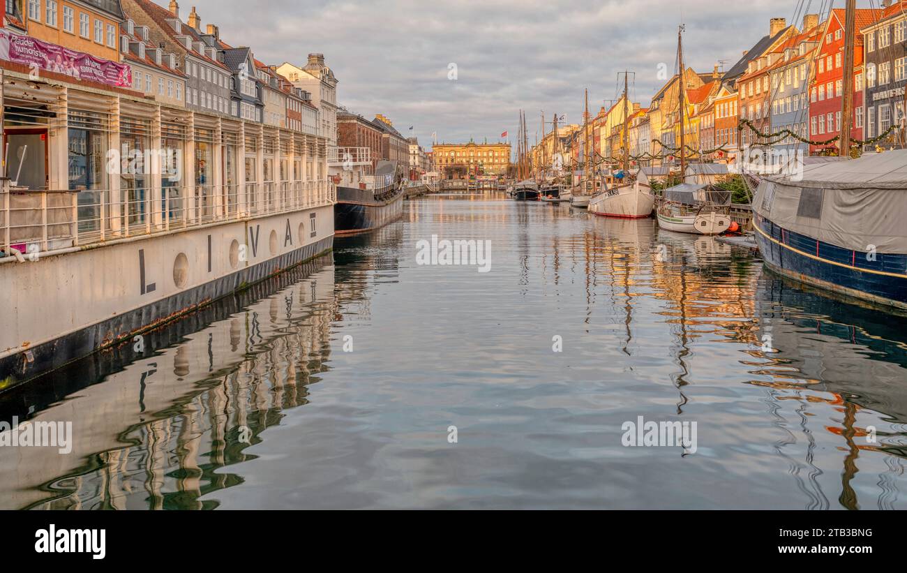 The restaurant boat Liva II an early morning on the quayside of the Nyhavn Canal in Copenhagen, November 25, 2023 Stock Photo