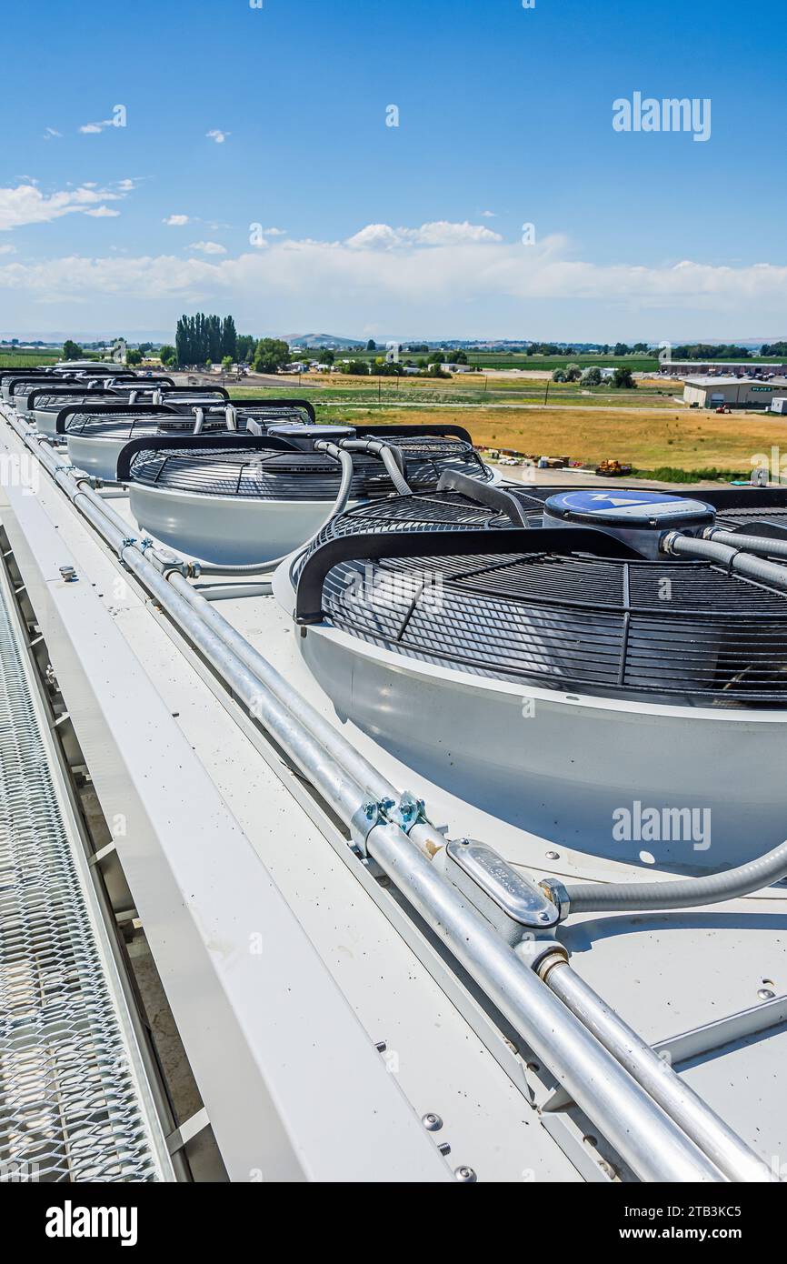 Electric fans on top of an adiabatic condenser on the roof at a CO2 coldstorage (industrial