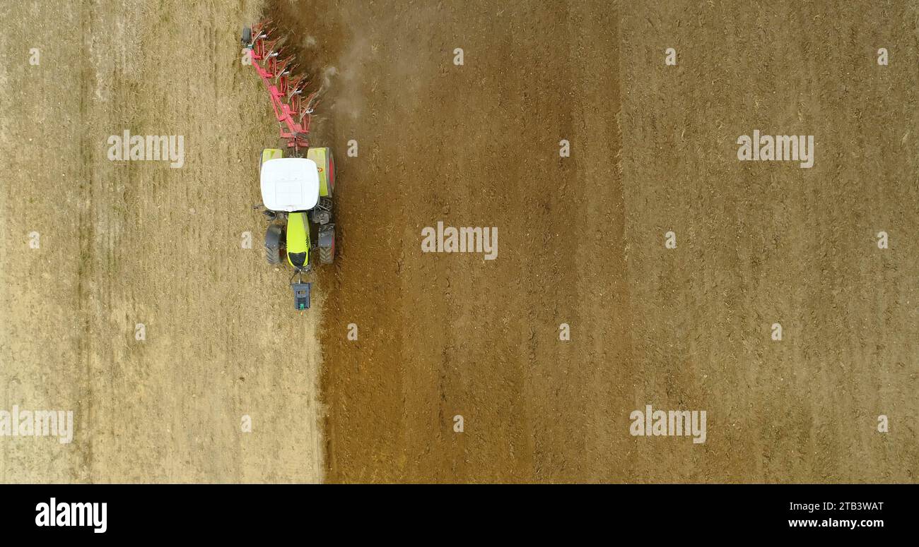 Field tractor plowing land wide hi-res stock photography and images - Alamy