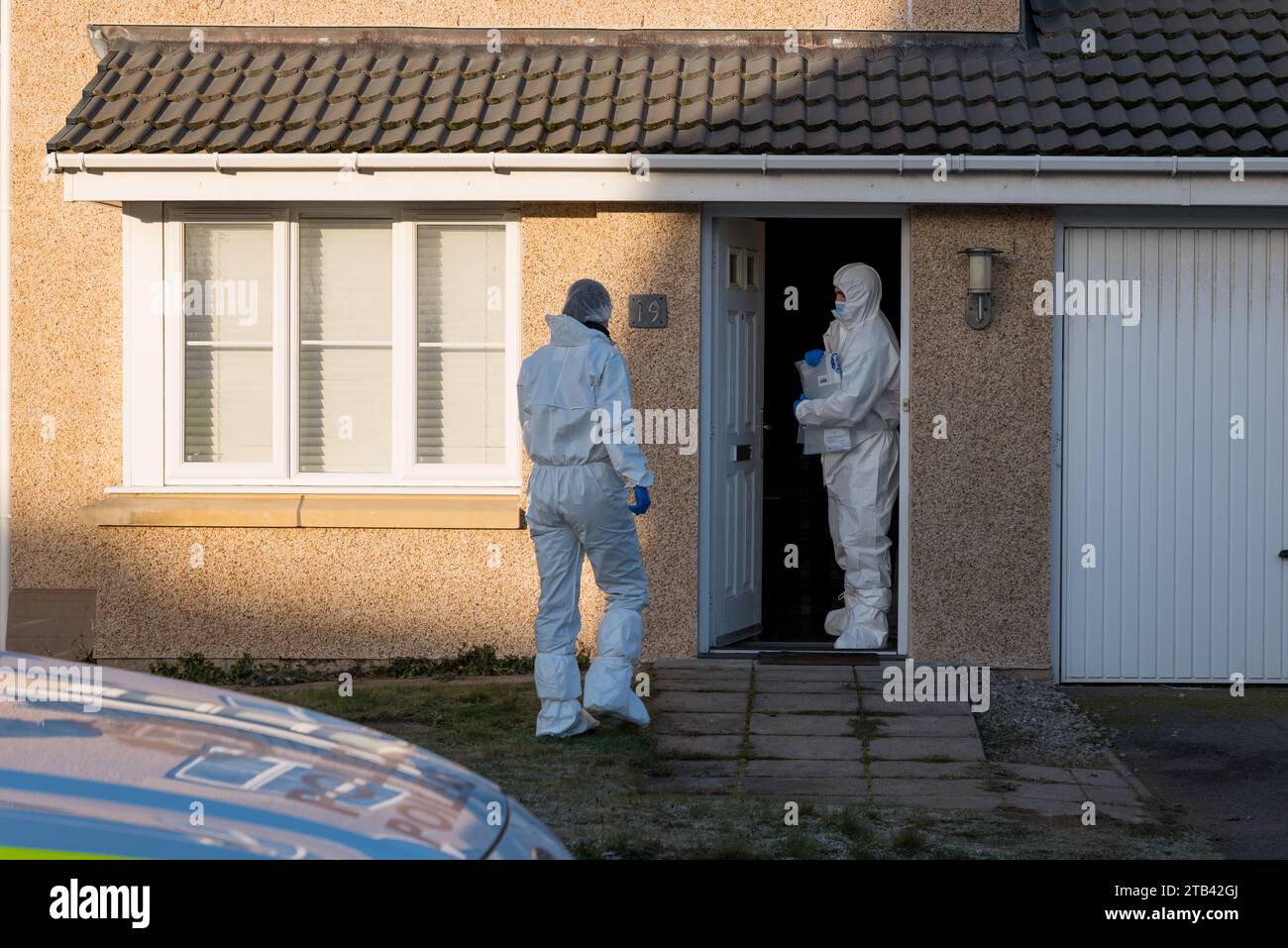 2 December 2023, Elgin,Moray,Scotland. This is Police Scotland Forensics team with White Forensic Suits working a domestic house in Elgin during a Mur Stock Photo