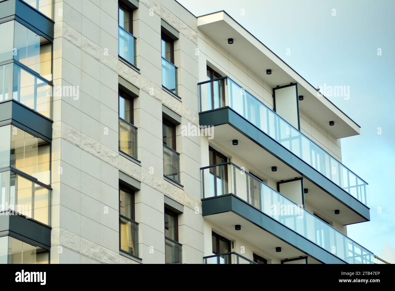 Flats In Building Multistory new modern apartment building. Stylish living block of flats ...