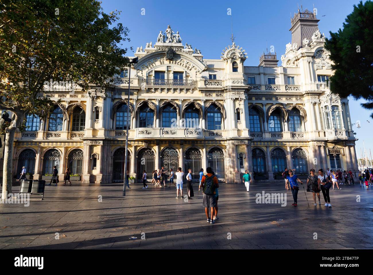 Pedestrians in front of the historical building of the port authority, Port de Barcelona, city centre, Barcelona, Spain Stock Photo