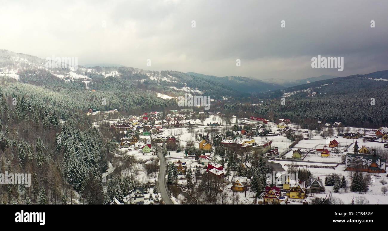 forest covered with snow aerial view. Aerial View of Village in ...