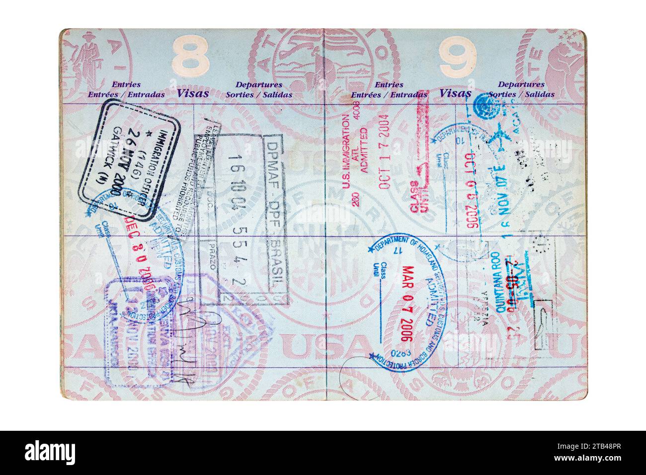 Manila, Philippines, December 4, 2023 American Passport with exit and entry stamps isolated on white background with copy space Stock Photo