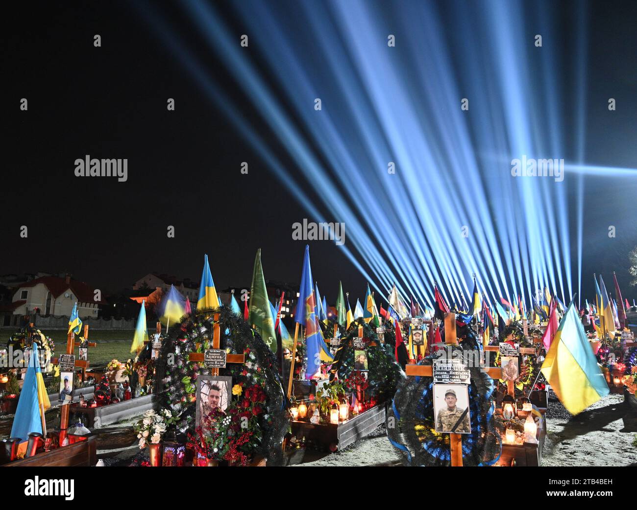 Lviv, Ukraine - February 23, 2023: Lychakiv Cemetery with a light installation to mark the first anniversary of Russia's war against Ukraine. Stock Photo