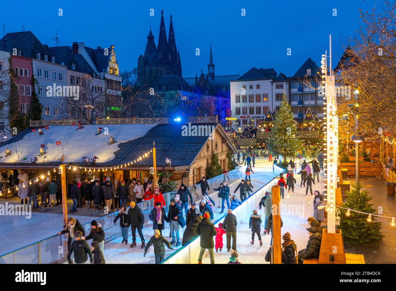 Ice skating rink at the Christmas market on Heumarkt in the old town of Cologne, Cologne Cathedral, Sunday shopping in Cologne city centre, 1st Advent Stock Photo