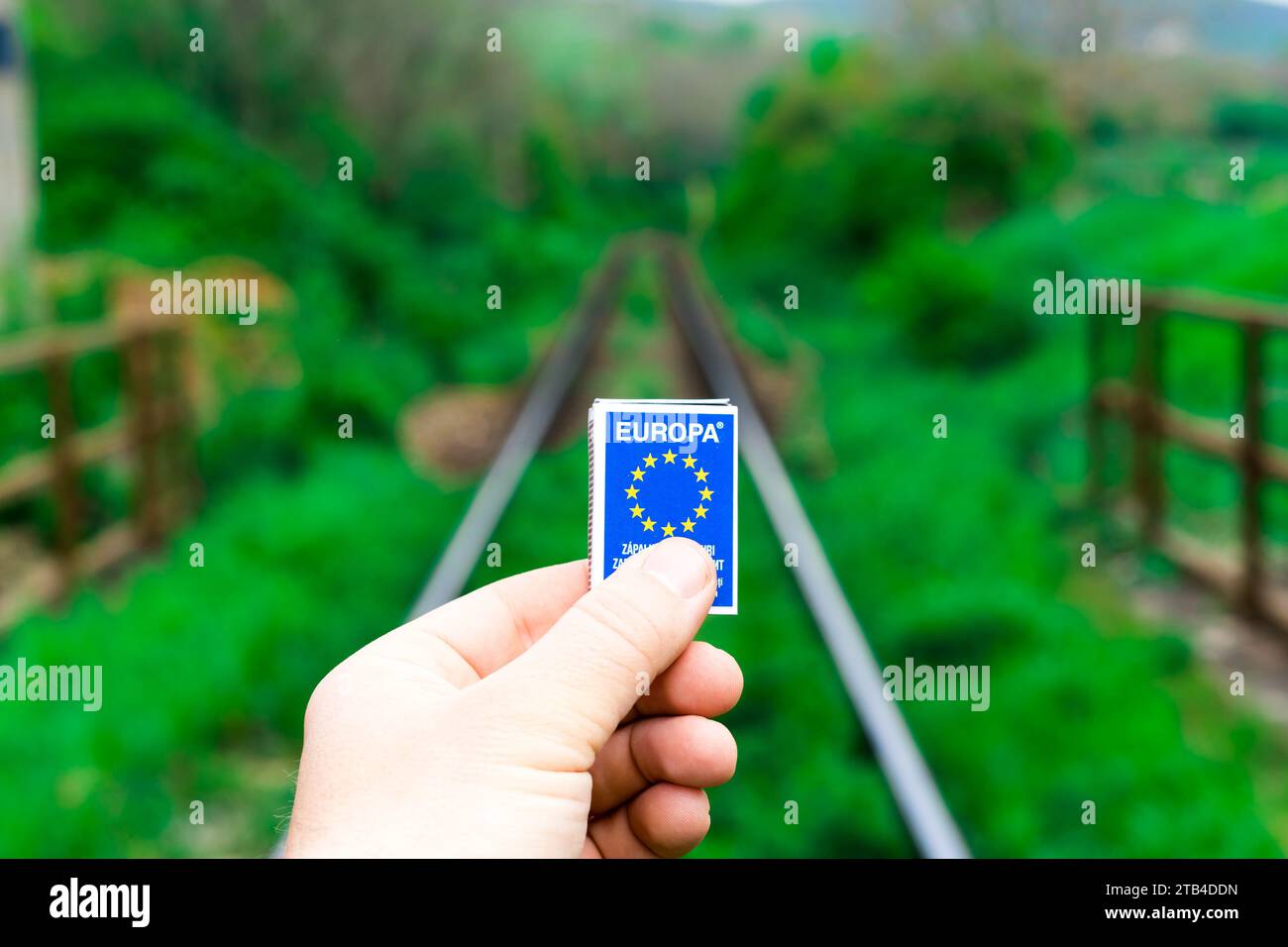 Matches on rails railroad tracks background, fire on railways concept