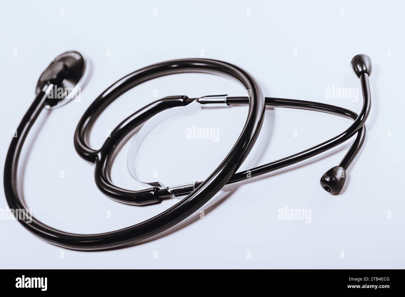 Black stethoscope isolated on white background Stock Photo - Alamy