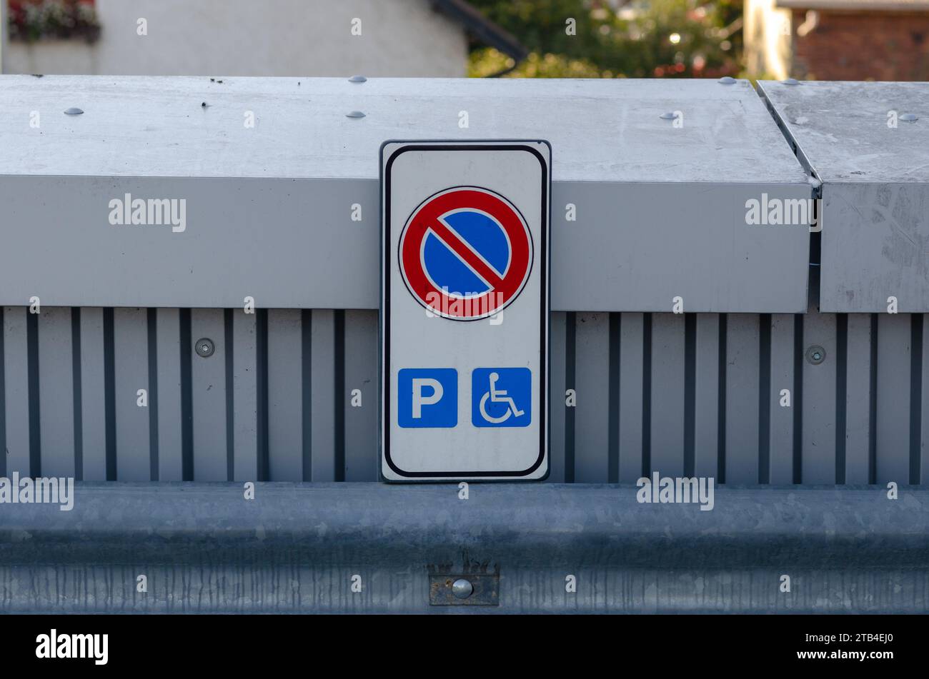 disability, street parking for disabled people, with no parking sign except for disabled cars Stock Photo