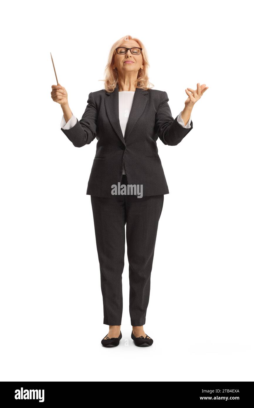 Full length portrait of a woman conductor directing a musical performance isolated on white background Stock Photo