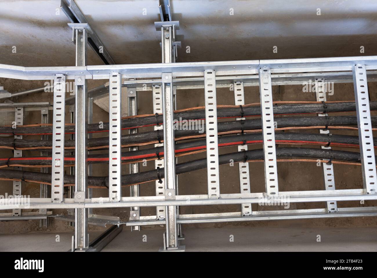 electric cable duct on a metal frame, cable pulling industrial area in
