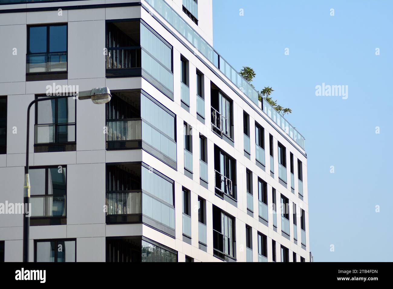 Flats In Building Multistory new modern apartment building. Stylish living block of flats ...