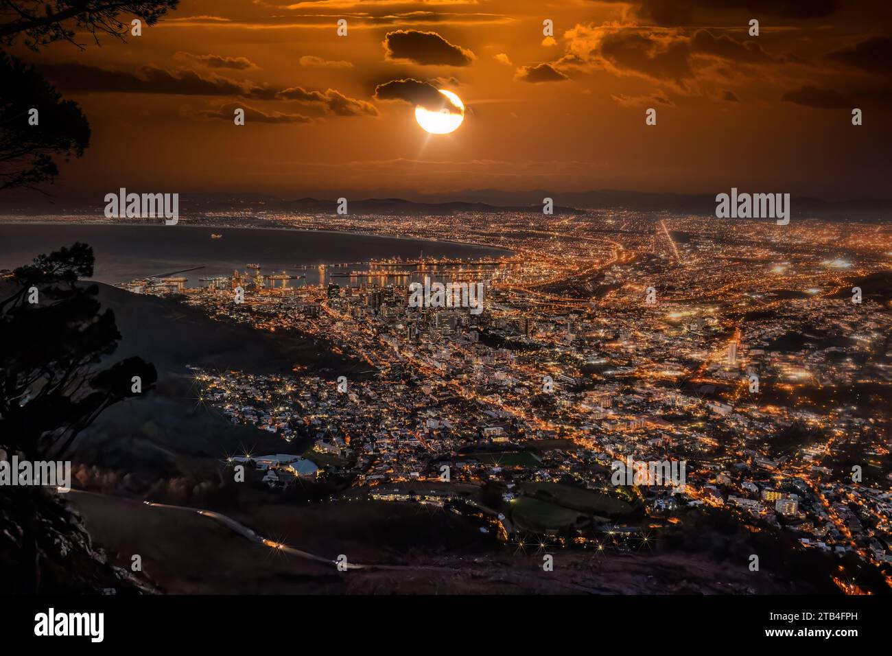 aerial view night Cape town, waterfront and the ocean, city lights are