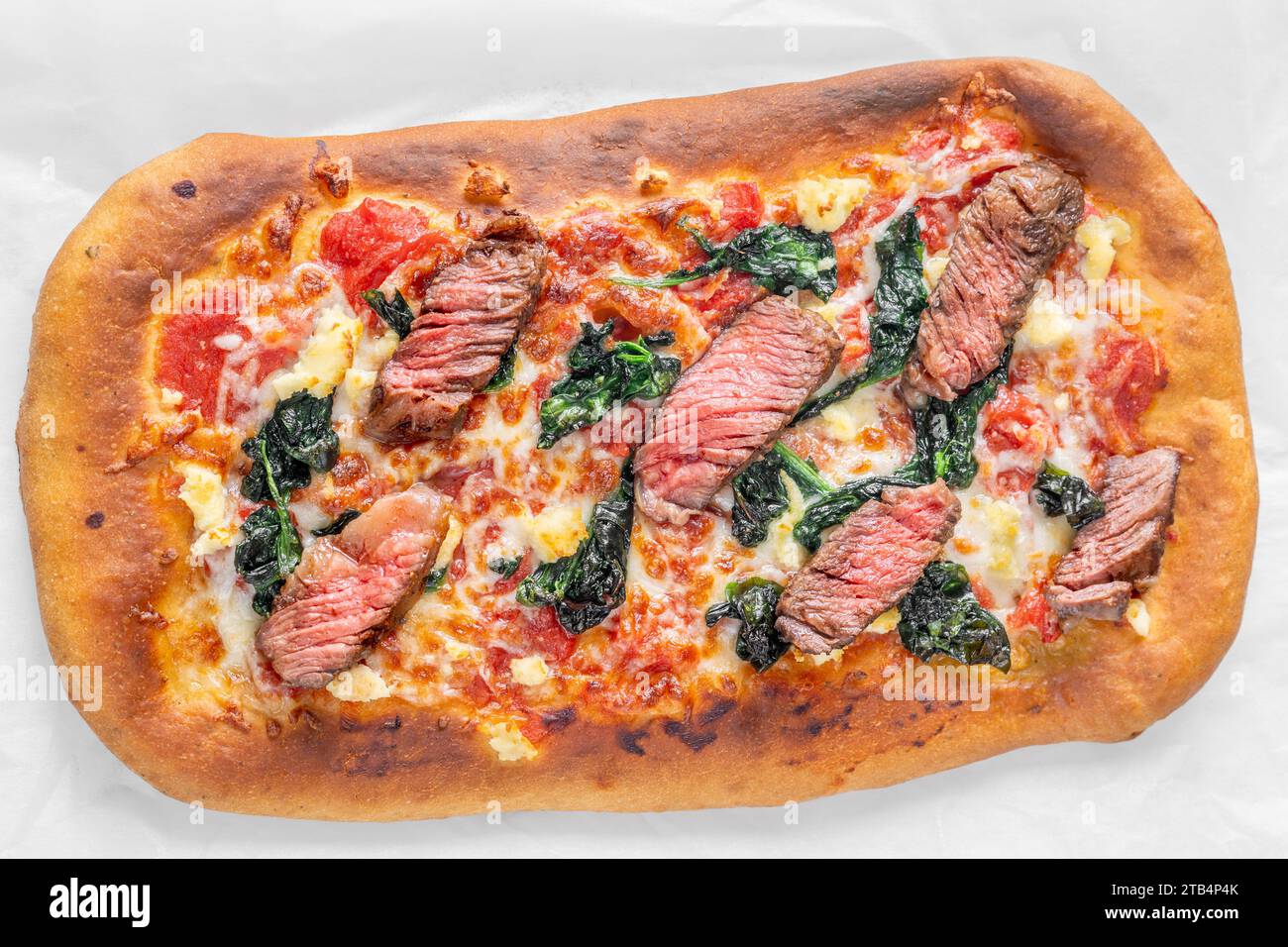 Beef steak focaccia with spinach and cheese Stock Photo