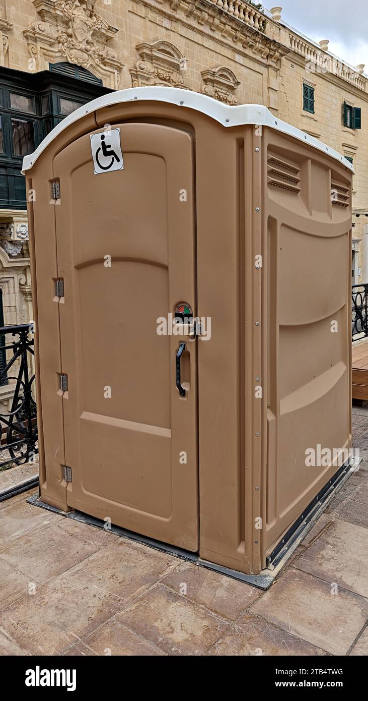 Portable restroom designed for disabled wheelchair accessibility placed