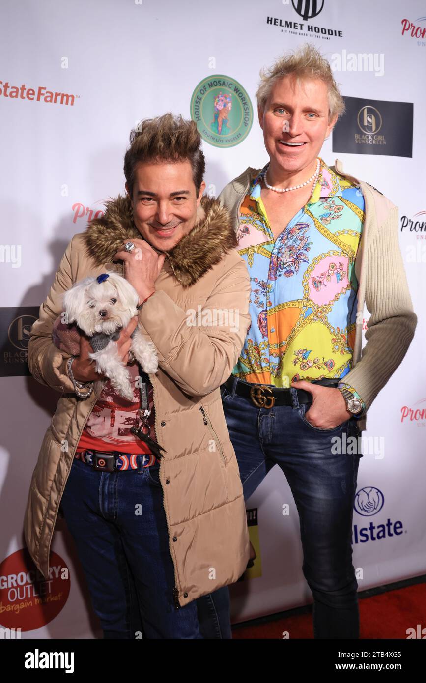 Los Angeles, California, USA. 2nd December, 2023. Pol' Atteu and Patrik Simpson with Snow White (dog) attending the Prom Expo Unlimited Fundraiser to benefit foster youth at a private location in Los Angeles, California.   Credit: Sheri Determan Stock Photo