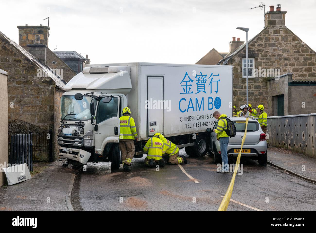 Convener Street, Elgin, Moray, UK. 4th Dec, 2023. This is the Chinese Cash and Carry truck that lost control on a decline of a very icy road, crashed into 2 parked cars and the front door of a house causing considerable damage. Credit: JASPERIMAGE/Alamy Live News Stock Photo
