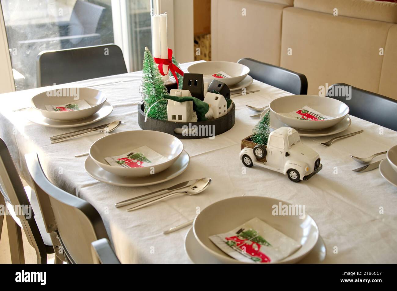Table decorated for Christmas dinner Stock Photo