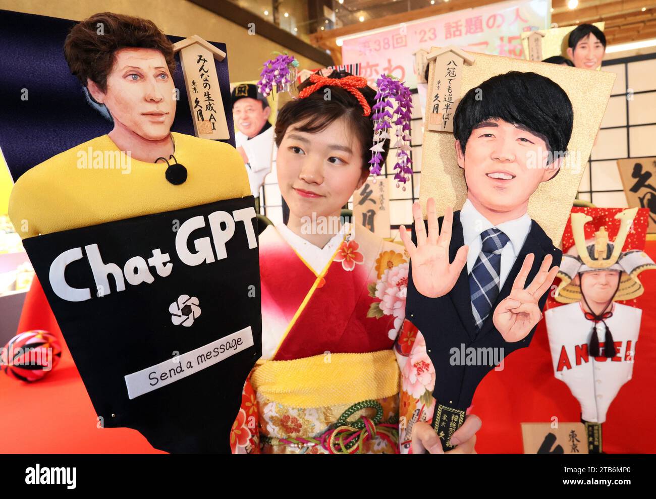 Tokyo, Japan. 5th Dec, 2023. Japanese doll maker Kyugetsu employee displays ornamental wooden rackets or hagoita with depiction of Sam Altman (L), Open AI CEO and shogi (Japanese chess) genius Sota Fujii (R) who won all eight titles for this year's faces at the company's showroom in Tokyo on Tuesday, December 5, 2023. Kyugetsu made special hagoitas for this year's newsmakers as year end tradition. (photo by Yoshio Tsunoda/AFLO) Stock Photo