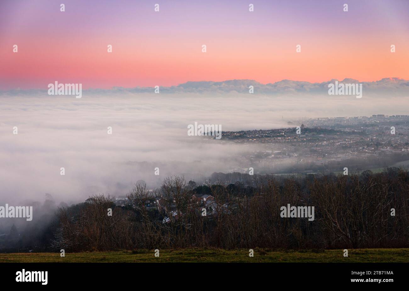 Winter sunset cloud inversion from Butts Brow on the south downs ...