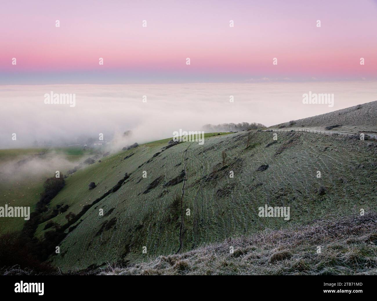 Winter sunset cloud inversion from Butts Brow on the south downs ...