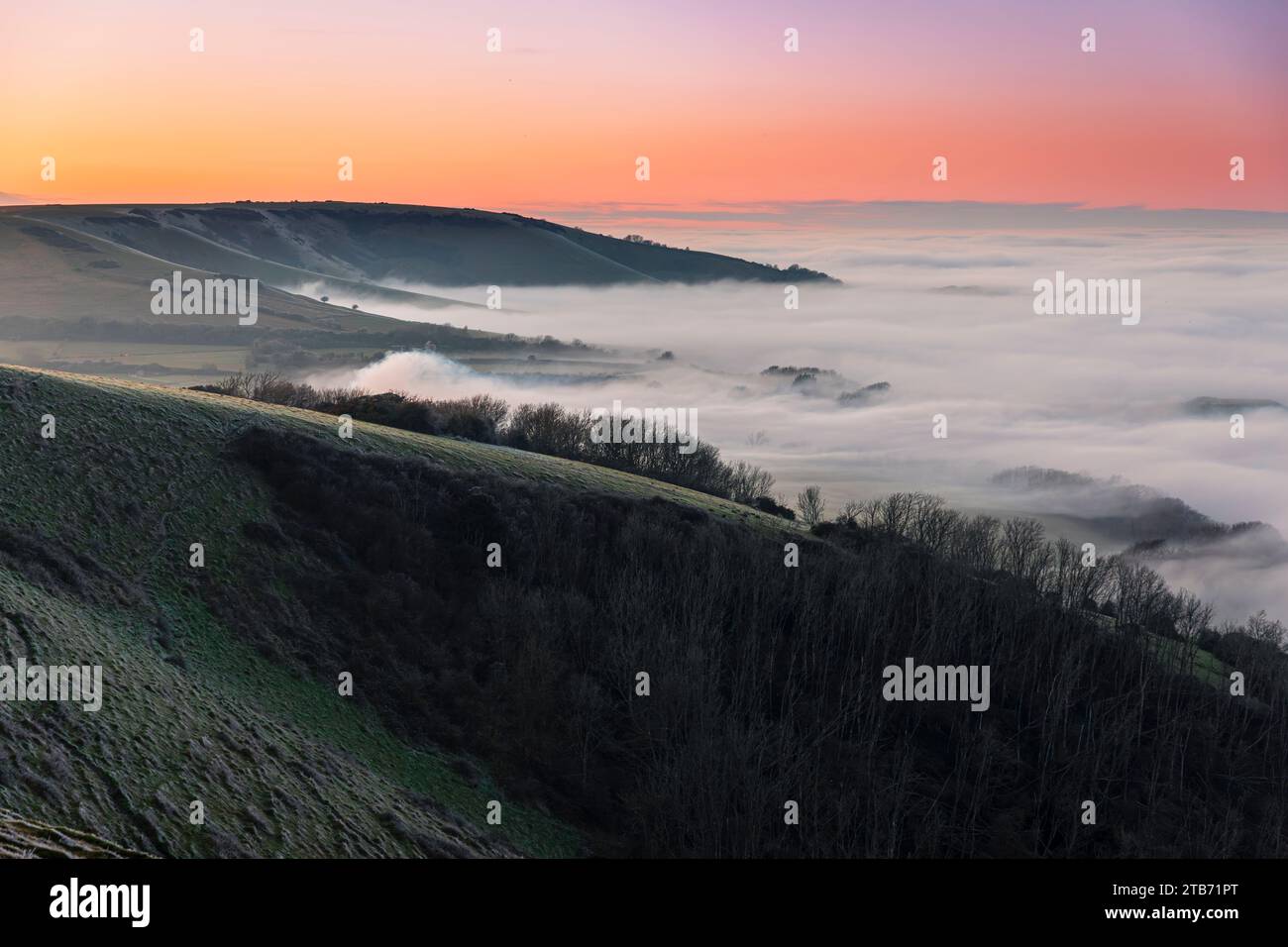 Winter sunset cloud inversion from Butts Brow on the south downs ...