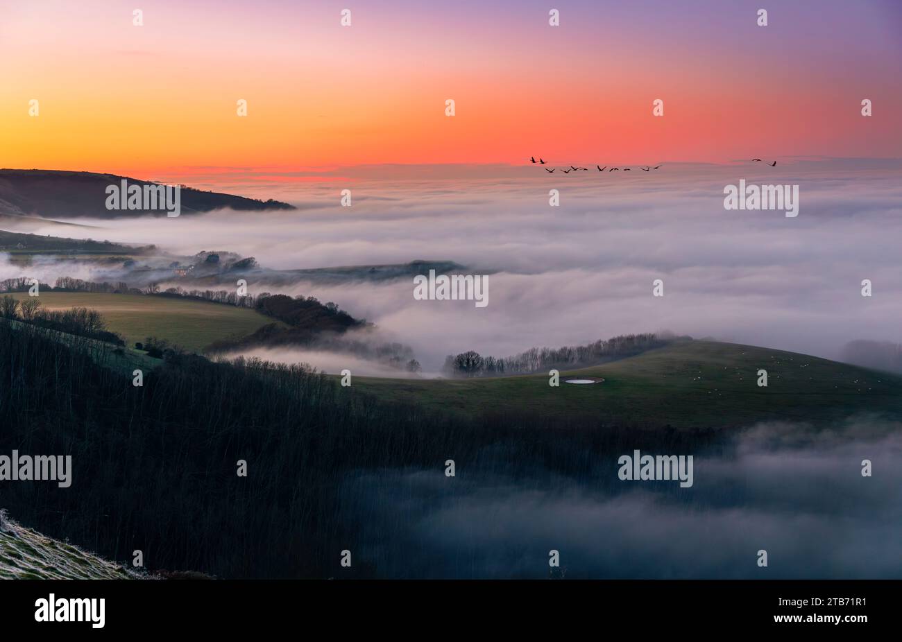 Winter sunset cloud inversion from Butts Brow on the south downs ...
