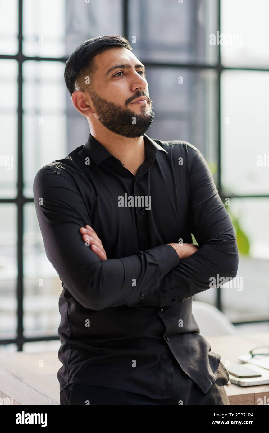portrait of a young businessman who is smiling Stock Photo - Alamy
