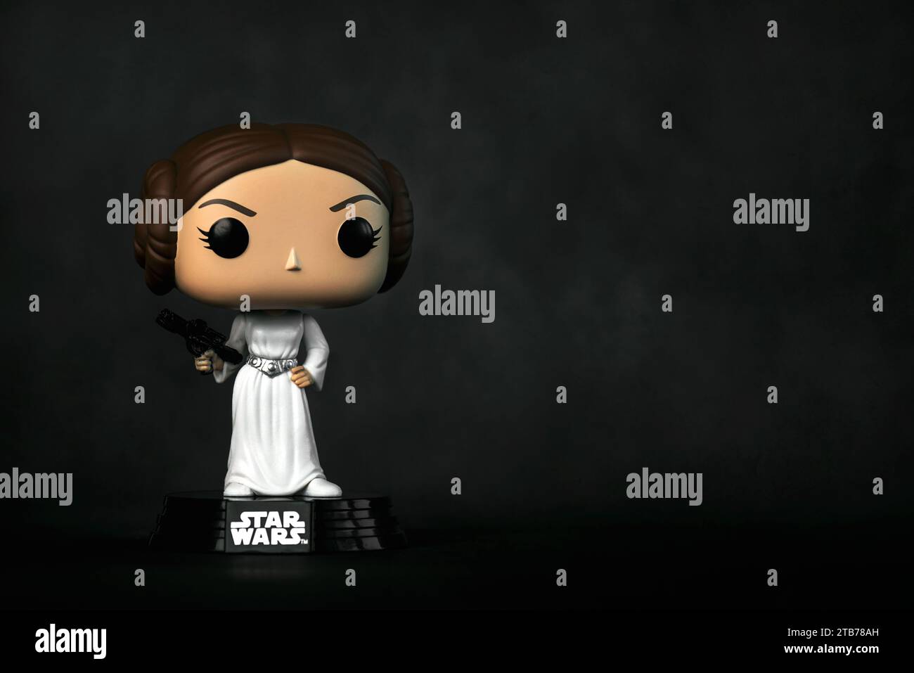 Funko POP vinyl figure of Princess Leia Organa from the movie Star Wars over grey background. Illustrative editorial of Funko Pop action figure Stock Photo