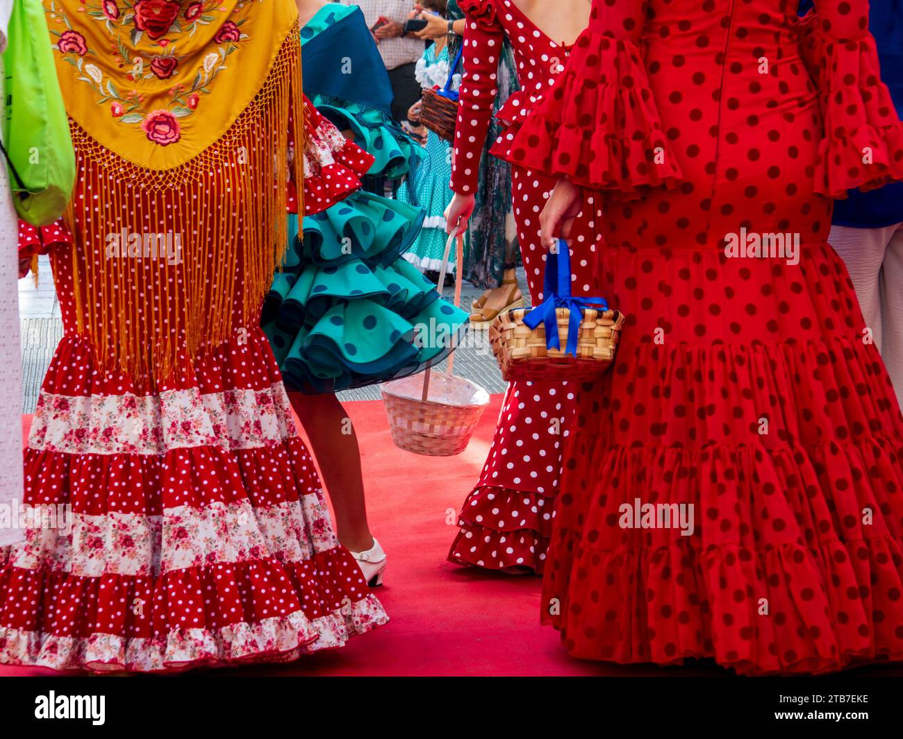 Flamenco dresses during the celebration of the Feria del Rosario in Fuengirola Stock Photo